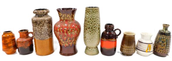 A collection of German fat lava vases, in mainly shades of red and brown, etc., the largest 31cm hig