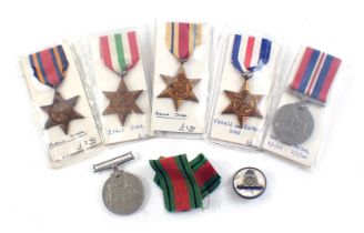 A group of WWII medals, comprising The Italy Star, Burma Star, 1939-45 war medal, Africa Star, Franc