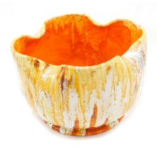 A 1930s drip glazed jardiniere, in orange, yellow, brown, indistinct marks to underside, 24cm wide.