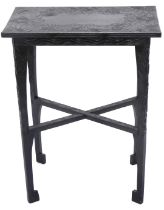 An Oriental style and ebonised occasional table, decorated overall with flowers and leaves, X shaped