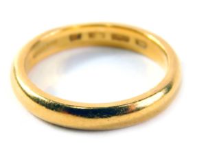 A 22ct gold wedding band, of plain design, ring size Q½, 6.8g.