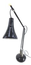 A black enamel painted Anglepoise lamp. (AF)