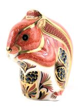 A Royal Crown Derby porcelain red squirrel paperweight, gold button and red back stamp, boxed.