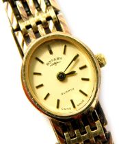 A Rotary lady's wristwatch, with oval watch face and cream coloured dial, on a silver watch bracelet