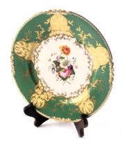 A 19thC Rockingham cabinet plate, with green and cream floral ground, part of the Rice collection, 2