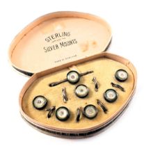 A set of Art Deco gentleman's collar studs, in presentation case, set with mother of pearl and paste