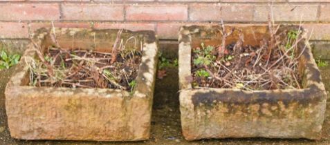 A pair of reconstituted square planters, 43cm wide.