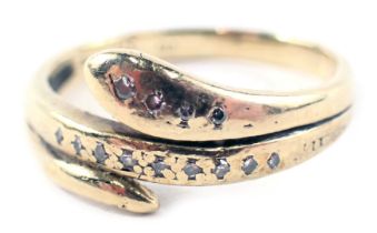 A 9ct gold snake dress ring, the central section formed as a snake set with tiny diamonds, ring size