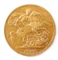 A Victorian full gold sovereign dated 1883.