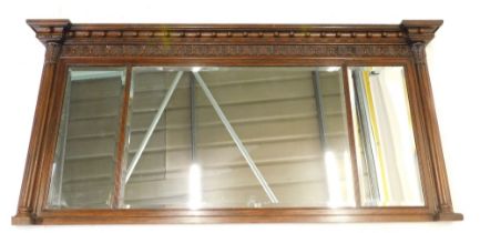 An unusual 19thC carved oak overmantel mirror, the break front moulded cornice applied with spheres,
