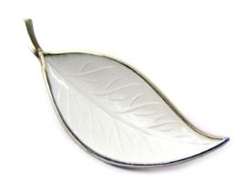 A Danish white enamel leaf brooch by Brodrene Bjerring, of moulded form, in white metal stamped ster