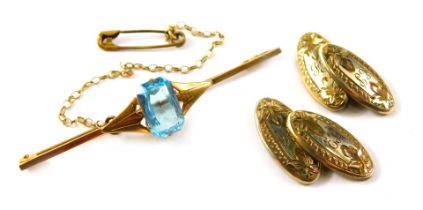A small group of jewellery, comprising a bar brooch set with central blue topaz, yellow metal bar, s