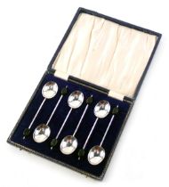 A set of six George V silver teaspoons, with black coffee bean top, Birmingham 1912, in fitted case,