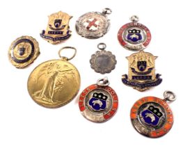 A group of commemorative cap badges, to include silver Leeds School enamel S.A badges, a Great War f