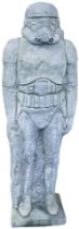 A reconstituted garden statue modelled in the form of a Storm Trooper, 83cm high.