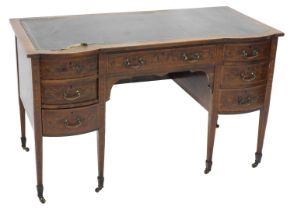 An Edwardian mahogany and marquetry writing table, by Maple & Co Limited, the top with a green leath