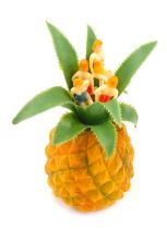 A mid-century novelty plastic cocktail stick holder, modelled in the form of a pineapple, holding fo