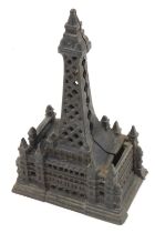 A late 19thC/early 20thC cast iron money box, modelled in the form of Blackpool Tower, 19.5cm high.