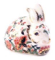 A Royal Crown Derby porcelain Meadow Rabbit paperweight, gold button and red back stamp, boxed.