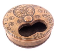 A 19thC pressed wood snuff box, decorated with a Prussian style double headed eagle and various roun