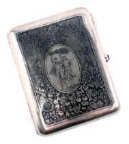 A Russian silver cigarette case, with niello decoration of rural workers or peasants carrying a whea