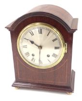 A 19thC mahogany cased mantel clock, with a silvered circular Roman numeric dial, twenty eight day m