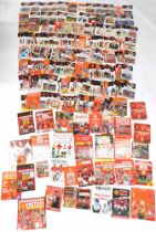 A large quantity of Manchester United review football programmes, 1970s, 80s, and later, etc.