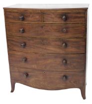 A Regency mahogany bowfront chest, of two short and four long graduated drawers, with oak linings an