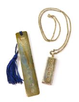 A silver ingot pendant and chain, and a silver bookmark with blue tassel top, 49.7g all in. (2)