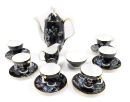 A Royal Albert Oriental pattern part coffee service, decorated with figures, horses, buildings, etc.