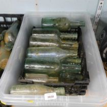 A quantity of green and blue glass bottles. (1 box)