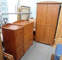 A hardwood bedroom suite, comprising two door wardrobe, tall five drawer chest, chest of four long a