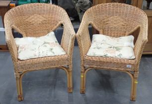 Two wicker chairs.