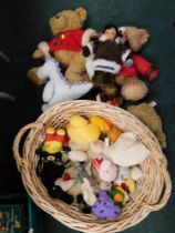 A oval wicker basket and contents of bears, to include two Harrod's 2013 bears, puppets, etc. (1 box