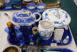 Blue and white wares, comprising decorative blue and white glassware, a 19thC blue and white teapot