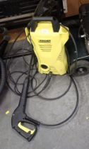 A Karcher K2 Compact pressure washer.