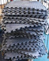 A large quantity of foam floor matting.