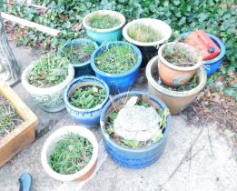 A quantity of garden planters, to include stoneware urn, blue glazed finished planters, petrol can,