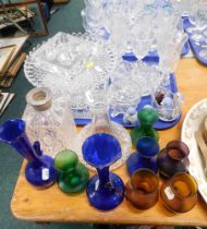 Decorative glassware, comprising drinking glasses, egg cruet, decanters lacking stoppers, coloured g