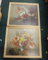 After Vernon Ward. Floral still life scene in cream frames. (2)