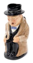 A Royal Doulton pottery character jug, modelled as Winston Churchill, in seated pose, printed marks,