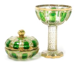 A late 19thC Moser style green and clear glass goblet, the octagonal faceted bowl with green glass r