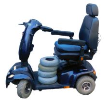 An Invacare Orion mobility scooter, in blue, with four spare tyres, seat pad, battery and key.