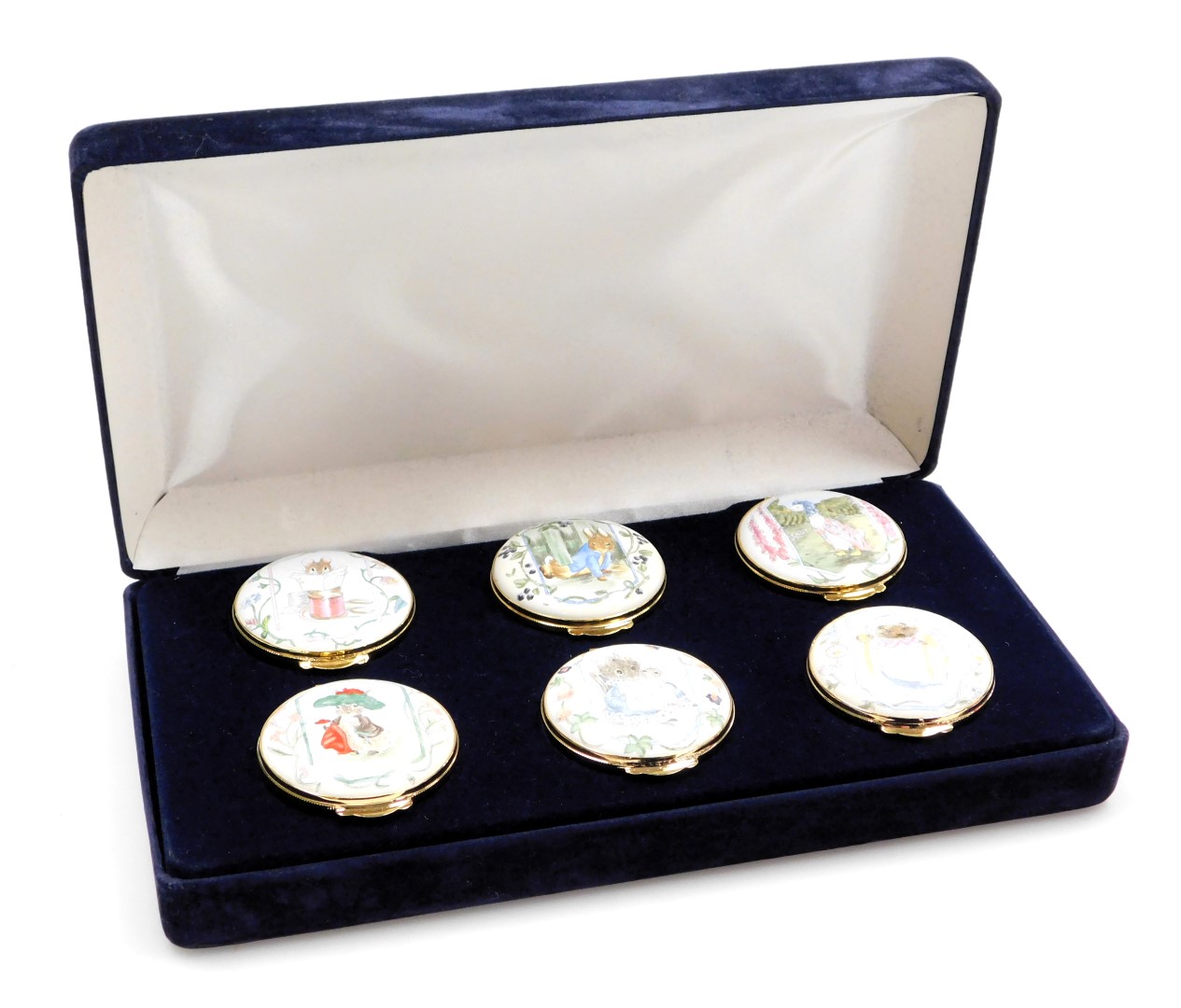 A set of six Crummels enamel Beatrix Potter boxes, for Royal Doulton, cased.