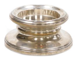 An Elizabeth II loaded silver desk stand, of plain, capstan form, Birmingham 2001, 13.88oz. 11.5cm d