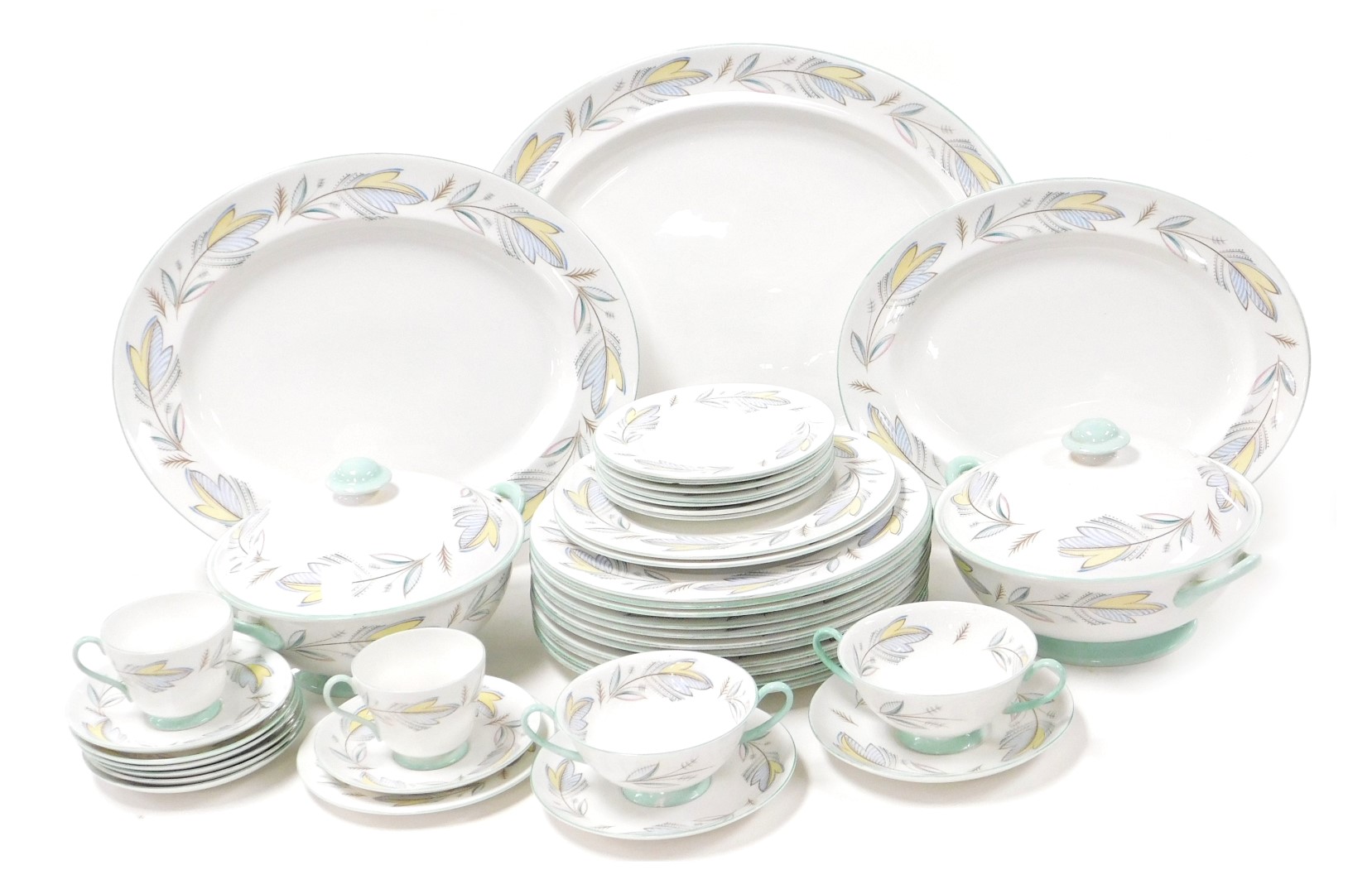 A Shelley porcelain Caprice pattern part dinner and tea service, comprising three graduated meat pla