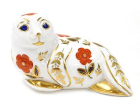 A Royal Crown Derby Imari Seal paperweight, gold stopper.