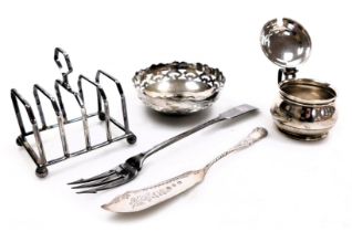 A group of small silver, comprising; a George V four division toast rack, London 1929, pierced circu