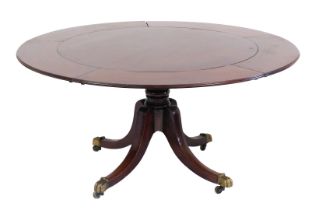 A Regency mahogany 'Jupe' type circumferential extending breakfast/dining table, the later top havin