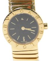 A Bulgari lady's 18ct gold cased wristwatch, with black dial bearing Arabic numerals at 6 & 12, quar